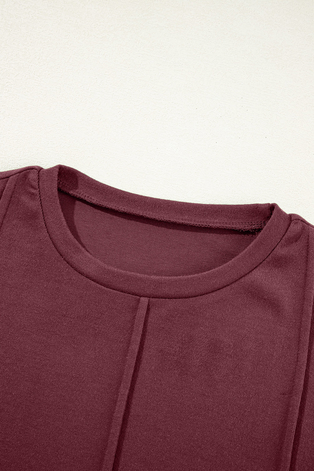 Judith Solid Exposed Seam Long Sleeve Top